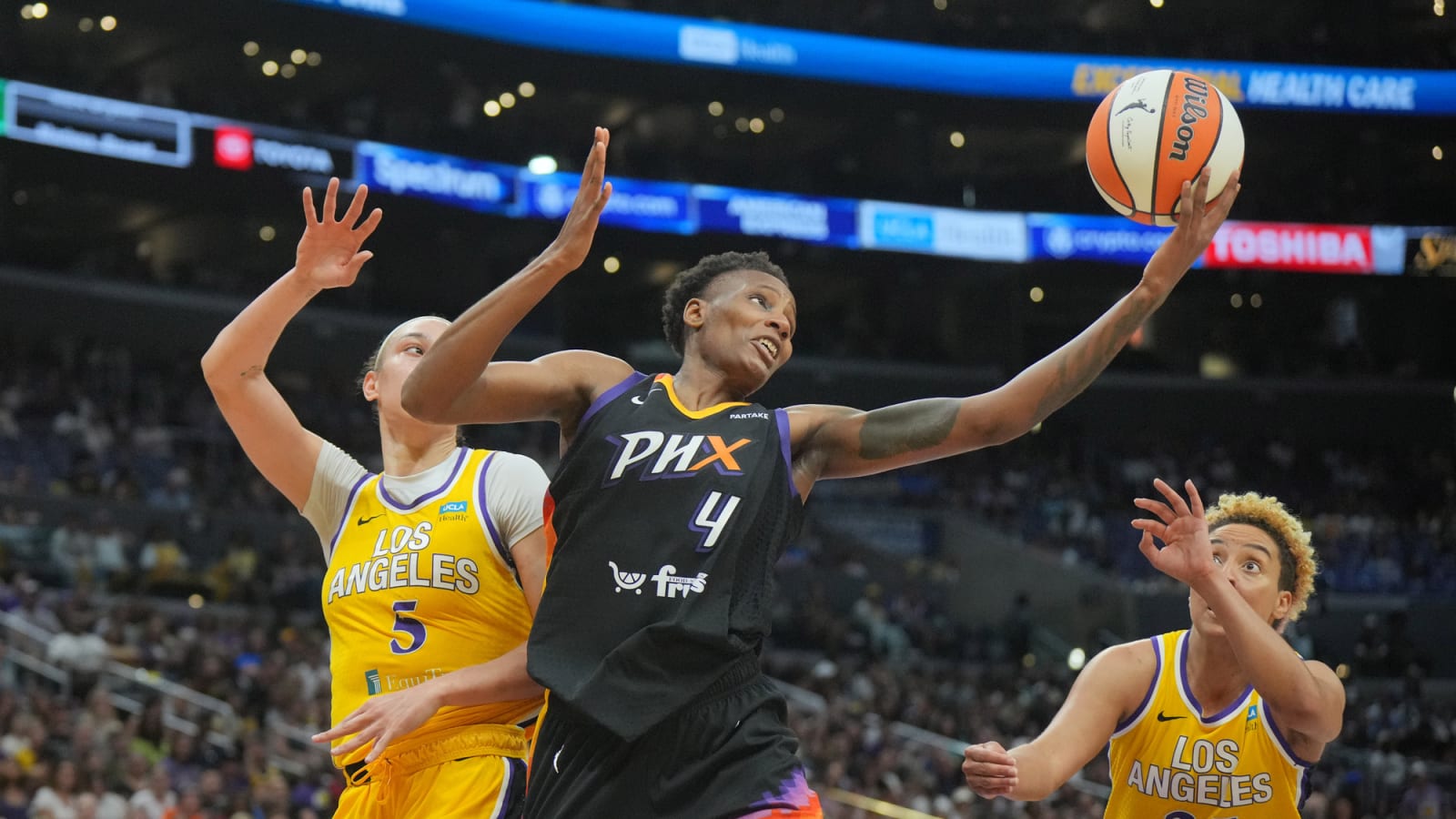 Suns G Monte Morris and Mercury F Natasha Mack throw out first pitch at Diamondbacks game