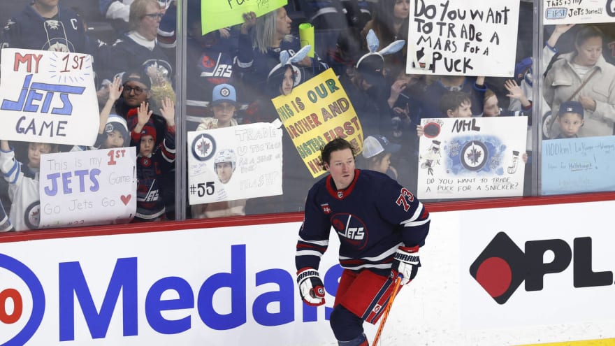 Tyler Toffoli walks around Toronto wearing a Canadiens jersey