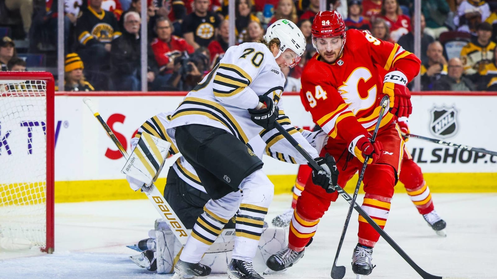 Flames win a battle with the Bruins in extra time