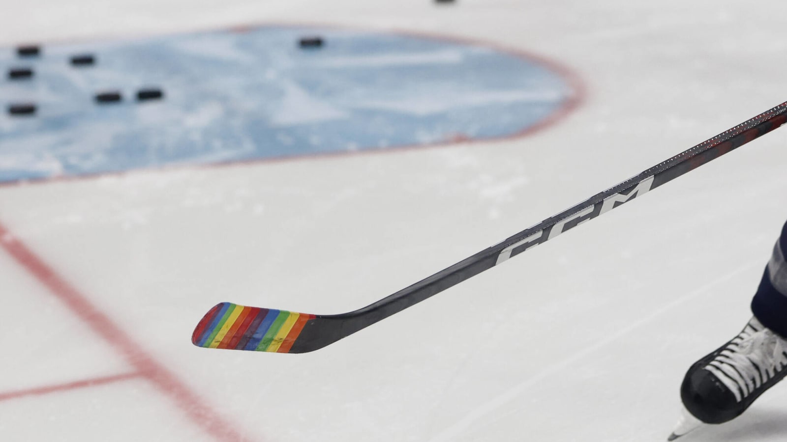 Multiple Edmonton Oilers, led by captain Connor McDavid, wear Pride Tape during warmups against Devils