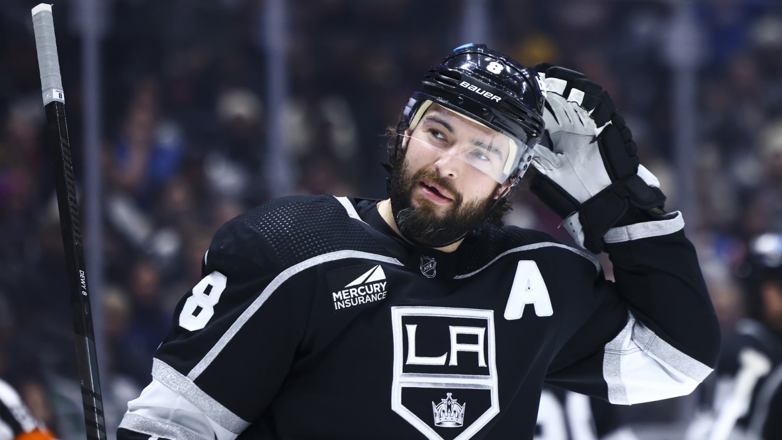 Kings' Drew Doughty helped off the ice in significant pain after awkward collision
