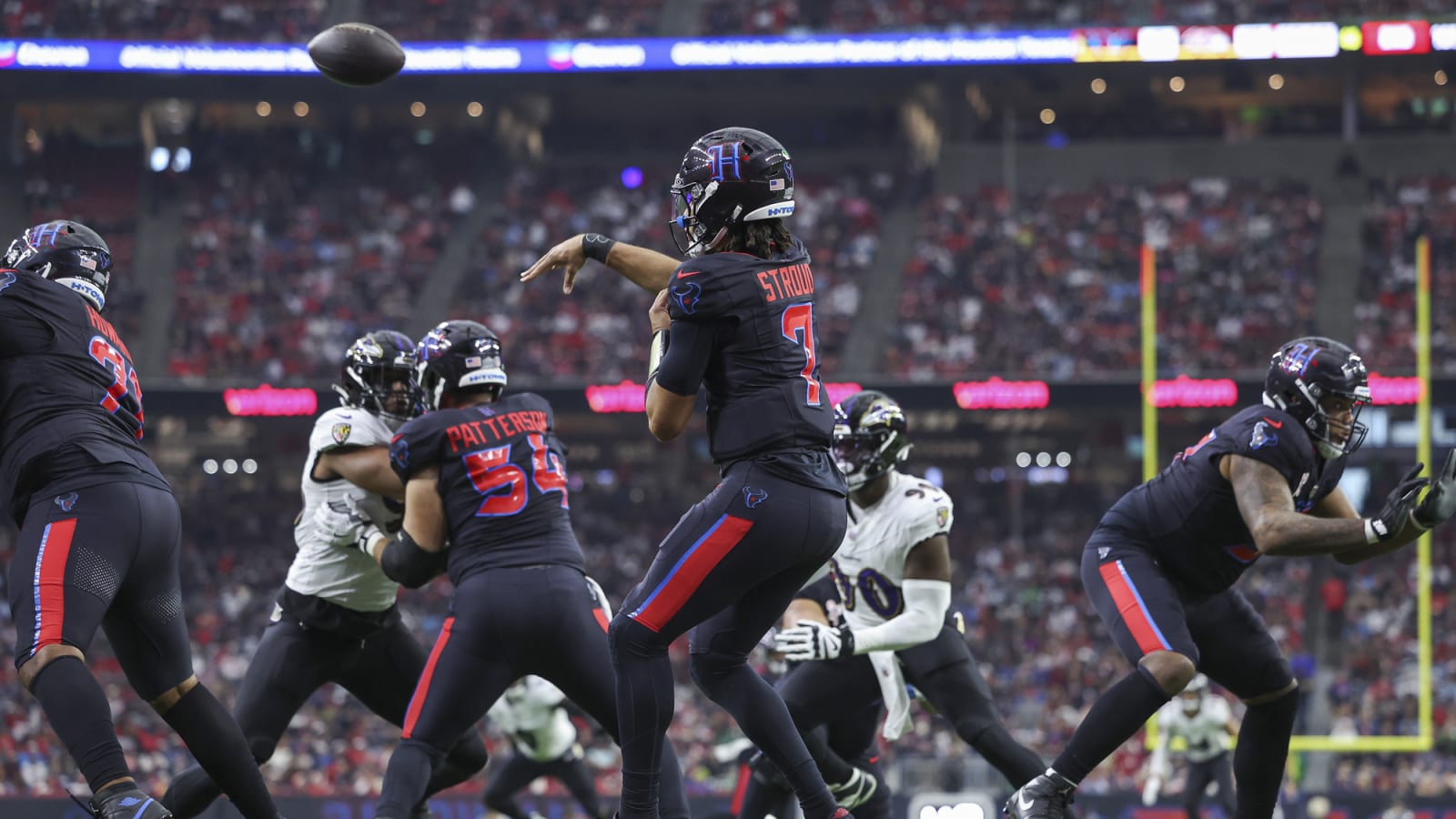 C.J. Stroud attempts a pass against Ravens at NRG Stadium