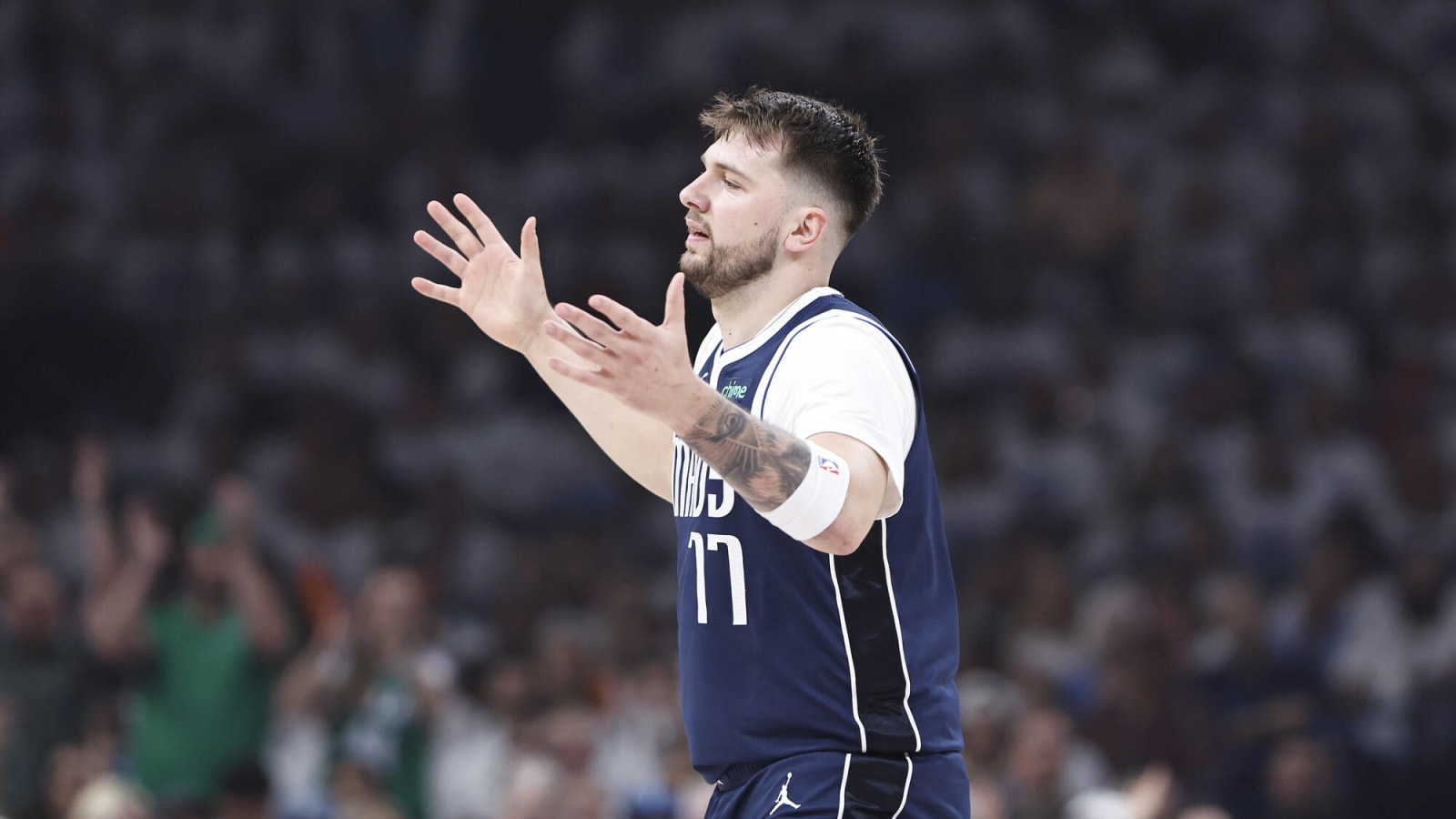 Watch: Luka Doncic stares in despair after OKC fan, from courtside, bizarrely throws ball away from him