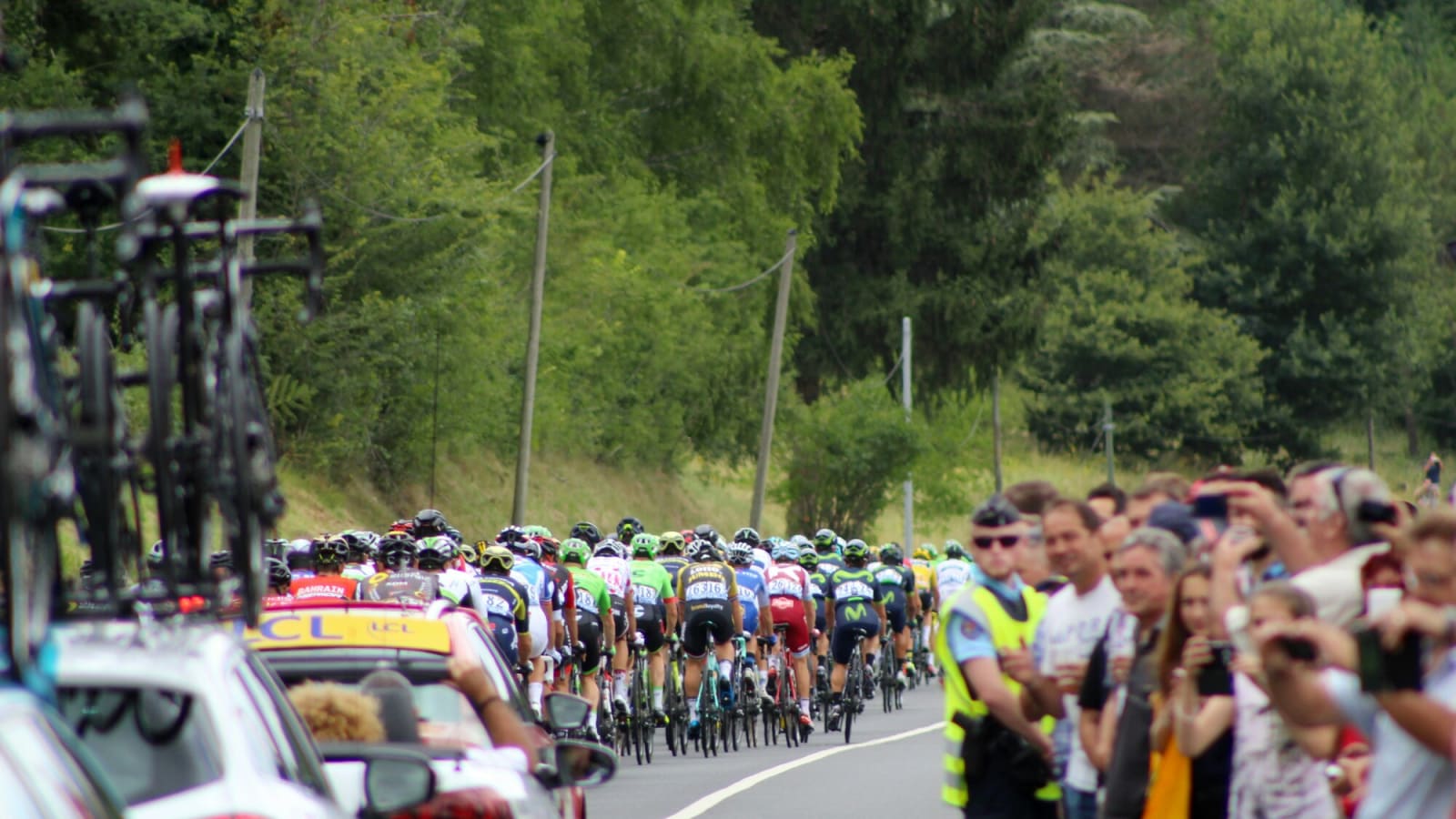 Cyclists riding on a paved road