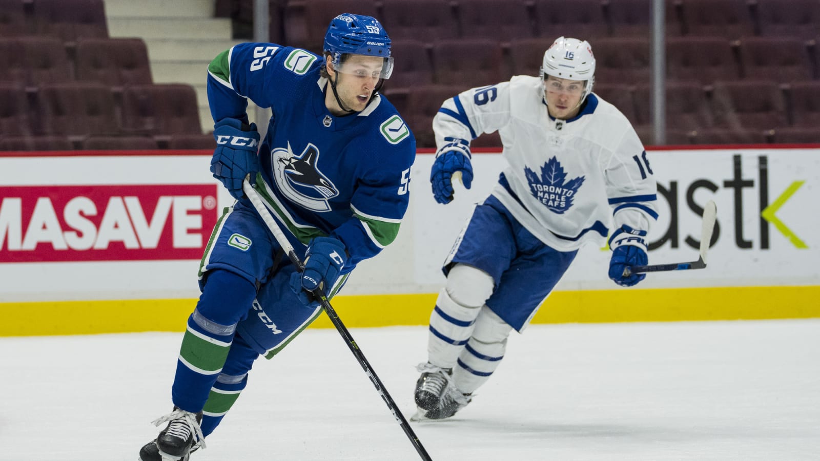 Canucks place Guillaume Brisebois and Jett Woo on waivers