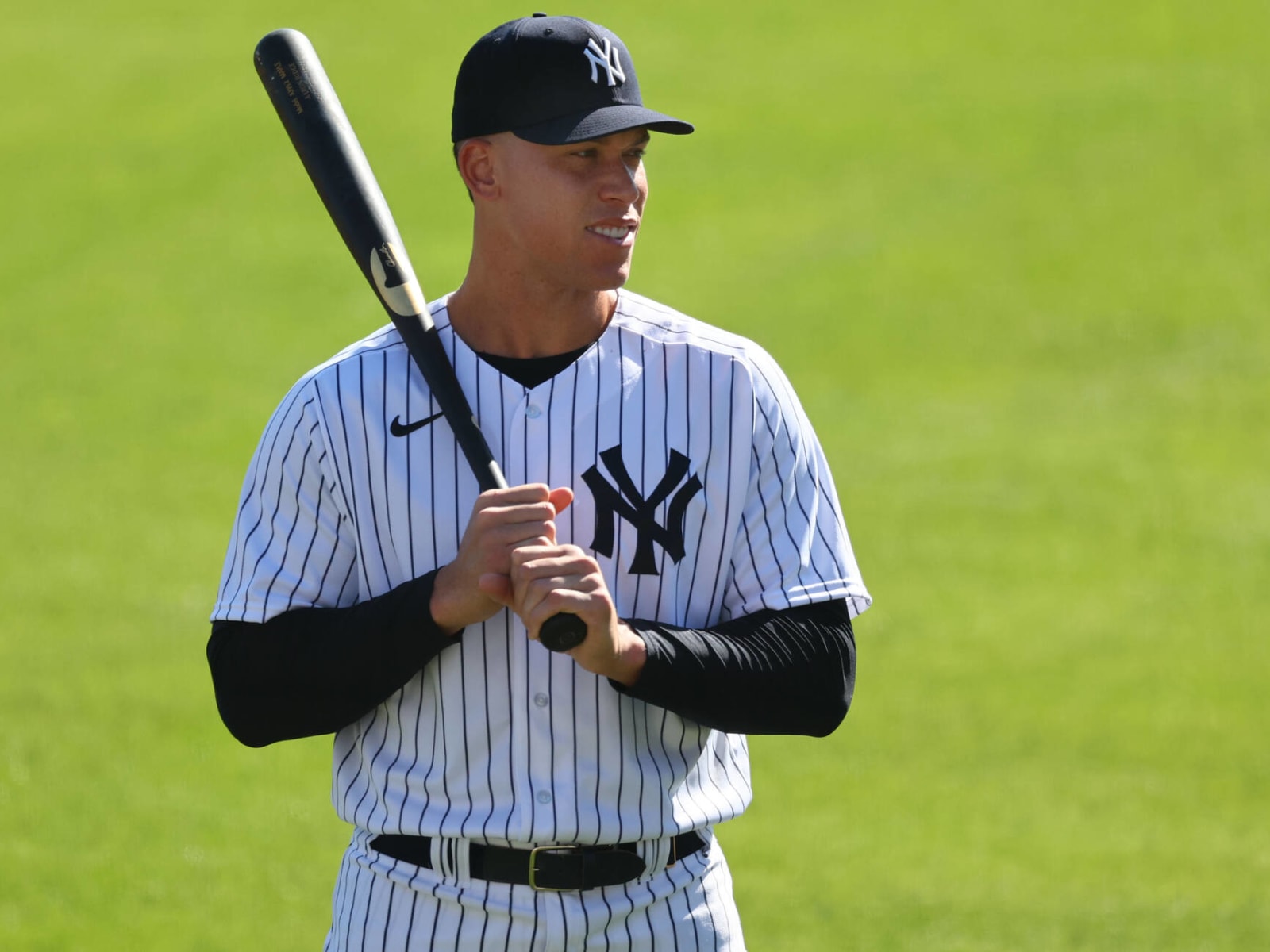 New York Yankees's Aaron Judge adjusts his pants during a baseball