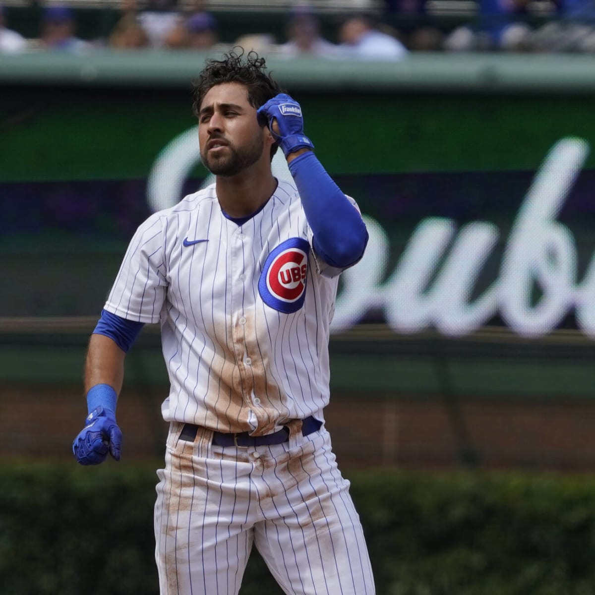 Alfonso Rivas of the Chicago Cubs walks to the dugout during the