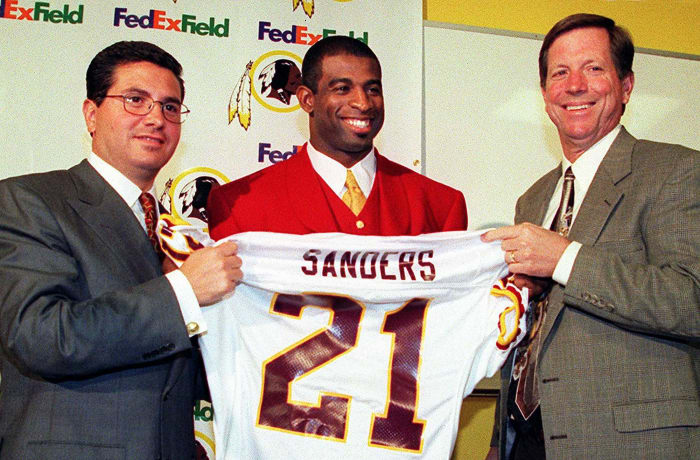 2000: Deion Sanders signs with Redskins