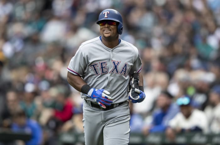 Young Texas Rangers fans wearing Adrian Beltre jerseys watch the