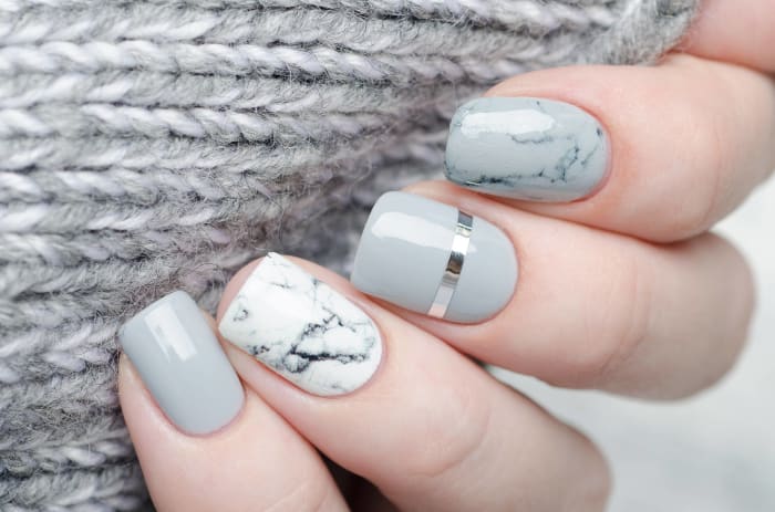 Use nail stamps to create fun designs without artistic effort