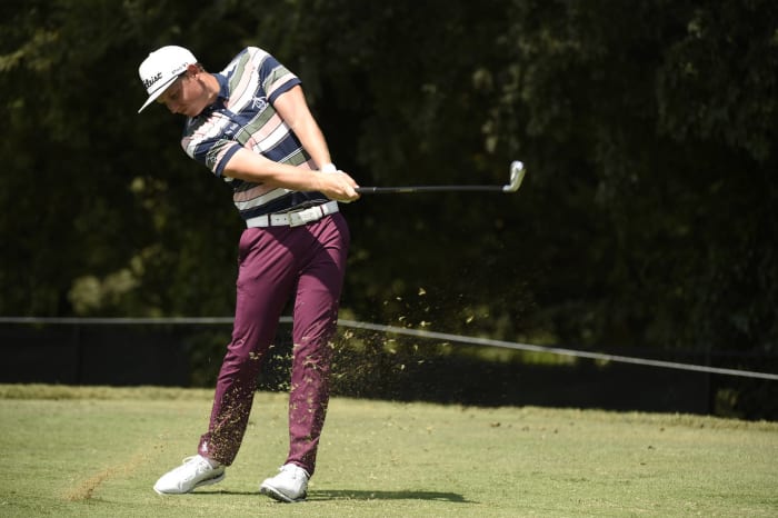 Golfer with cheap bright clothes