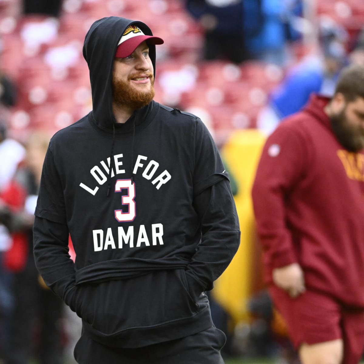 Carson Wentz posted pictures of him practicing in an Eagles helmet,  Commanders jersey, and Colts shorts 