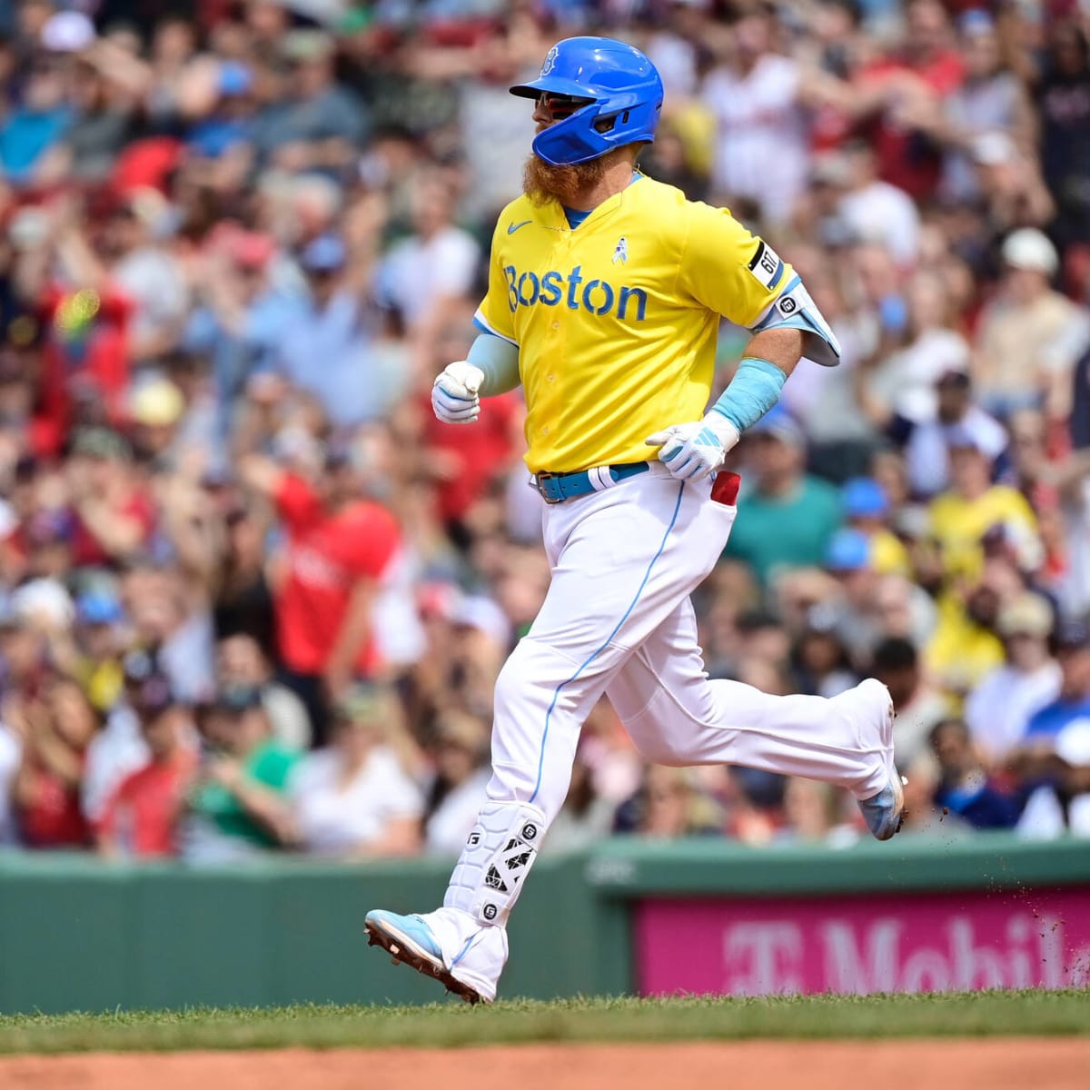 Why are the Boston Red Sox wearing yellow and blue uniforms today?