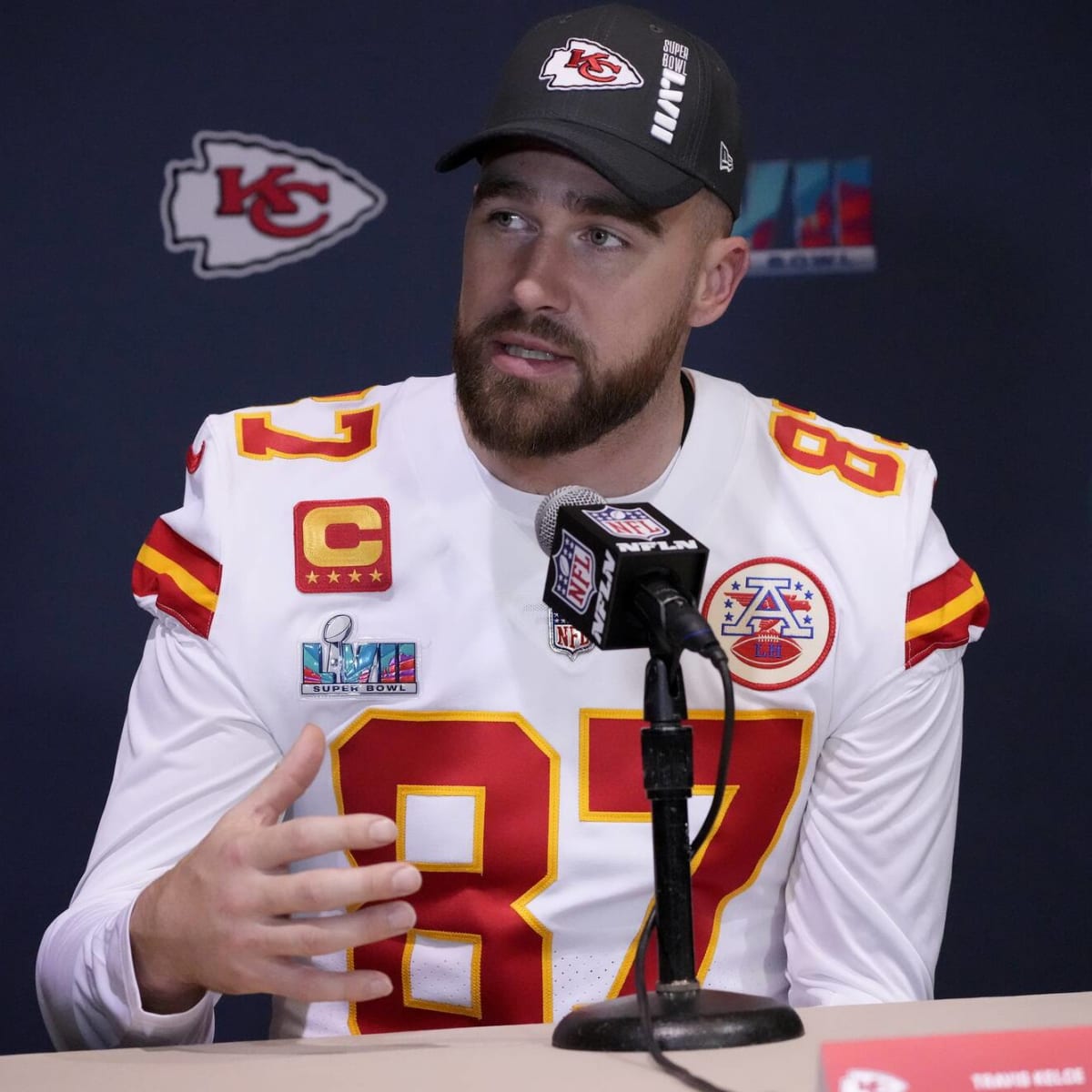 Travis Kelce with the Louis Vuitton camo fit for the Super Bowl