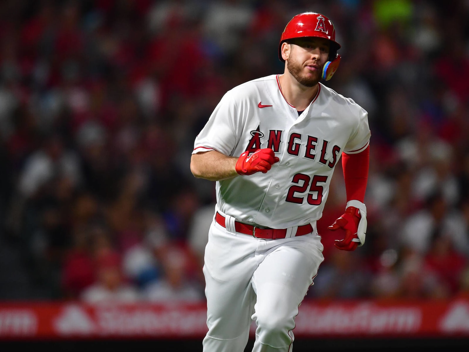 HOUSTON, TX - AUGUST 11: Los Angeles Angels first baseman C.J. Cron (25)  returns to the visitors' dugout in the bottom of the second inning during  the MLB game between the Los