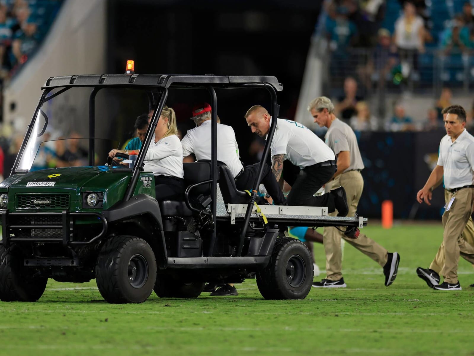 Dolphins' Daewood Davis conscious, moving after being carted off field