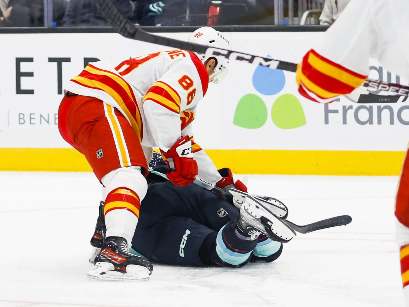 Flames' Mangiapane assessed match penalty for cross-checking Kraken's  McCann in neck