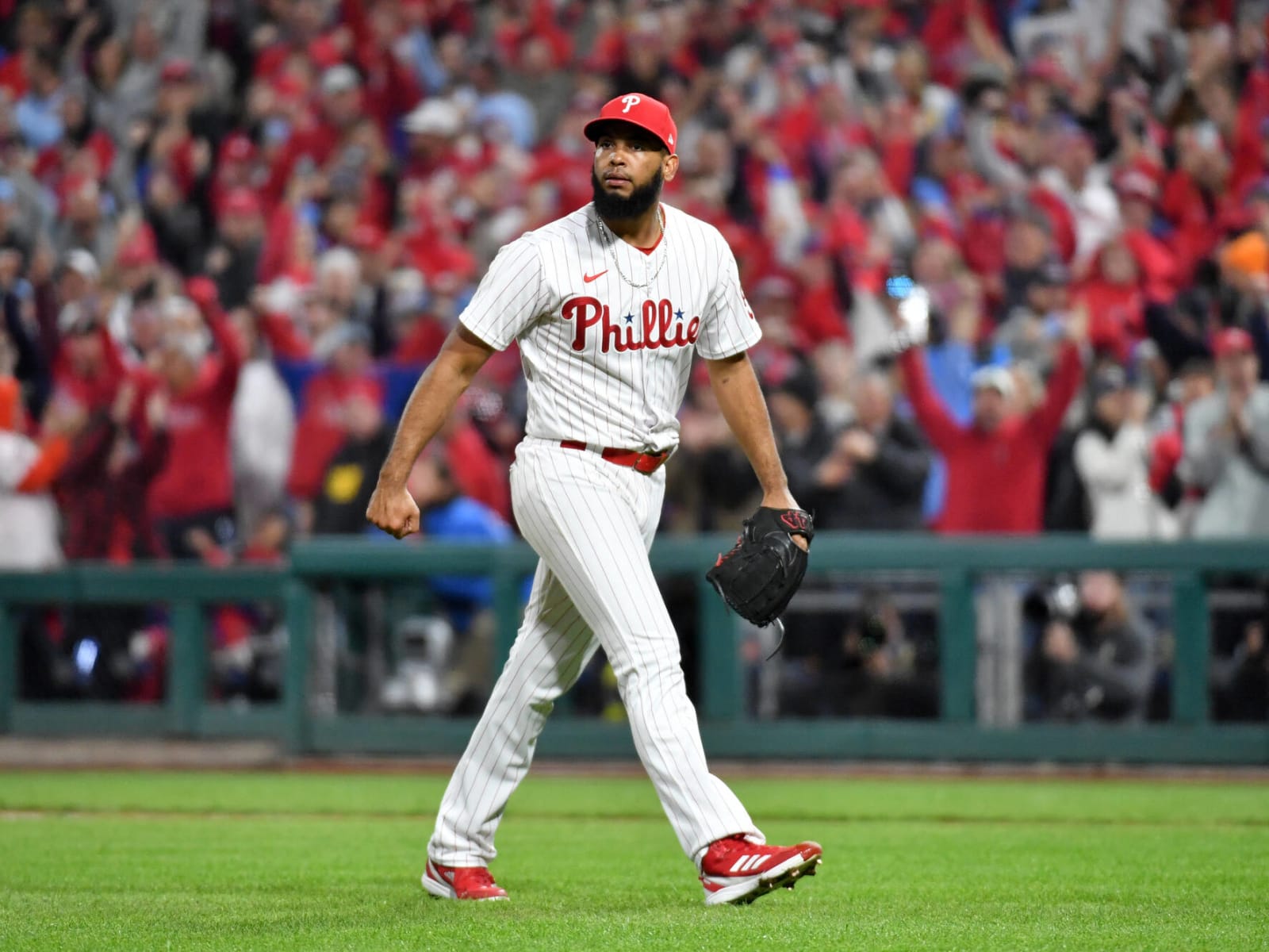 Seranthony Dominguez costs Phillies pitching through rain in Game