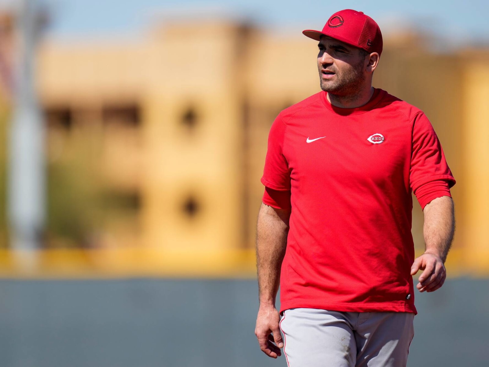 Why Joey Votto wore a high school football jersey in press conference