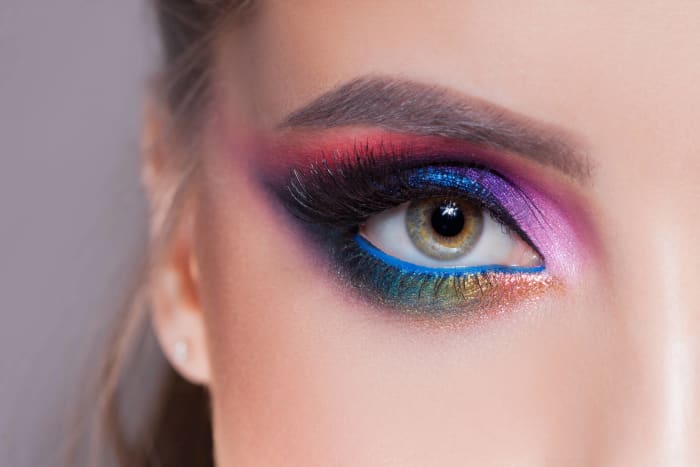 Use white eyeshadow as a base to make bright colors more vivid