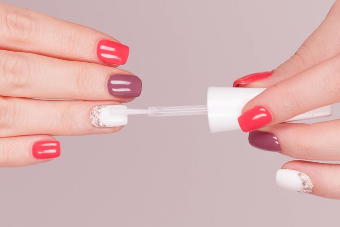 Use a fast-drying top coat to prevent smudges