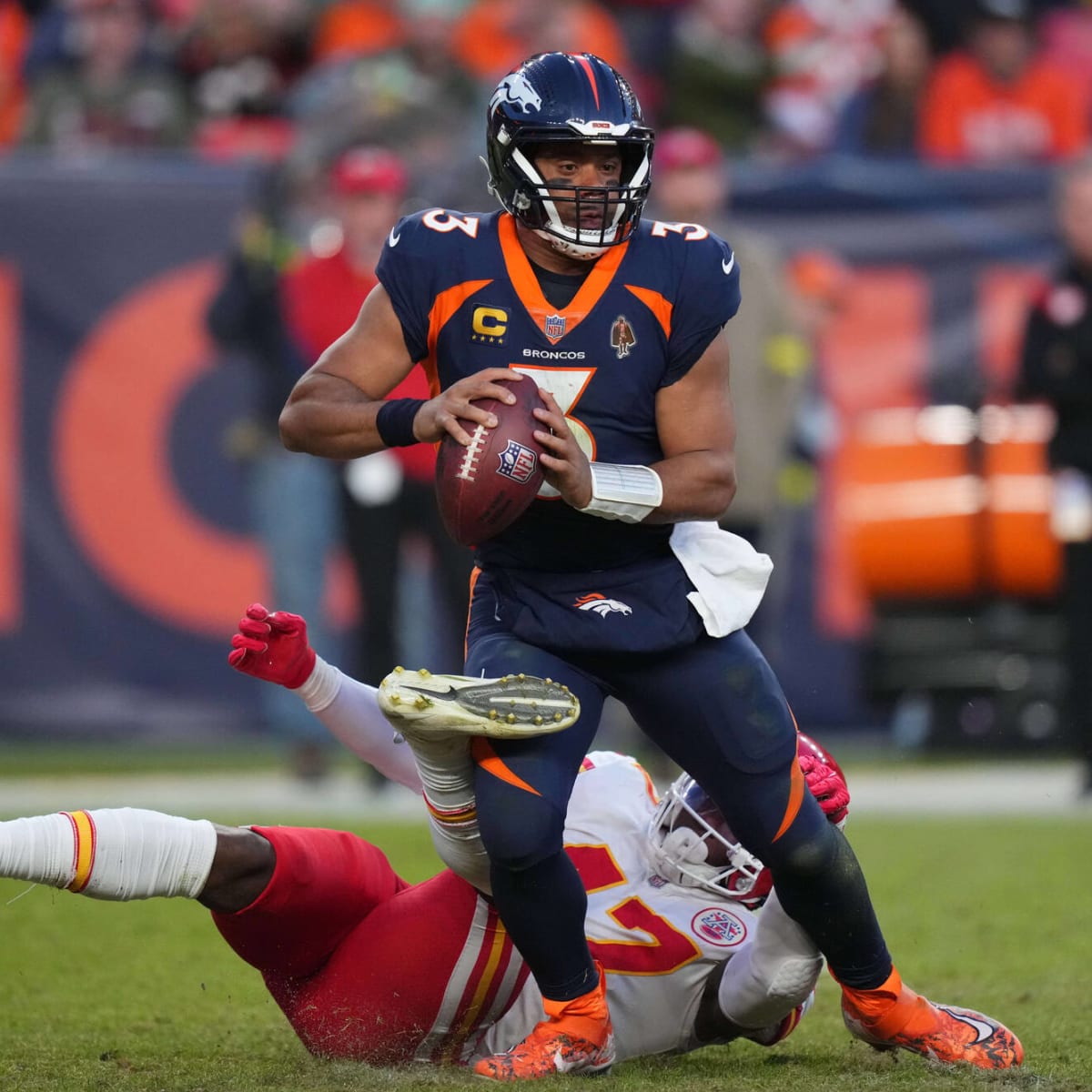 Broncos' Russell Wilson suffers big knot on his head as tackle