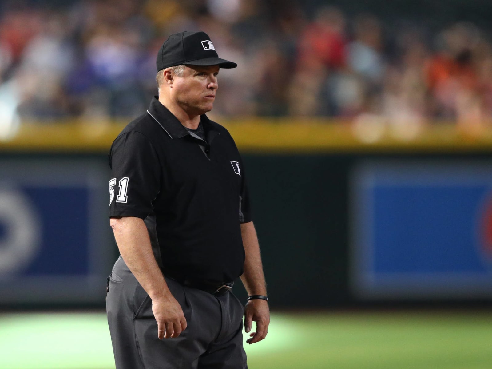 Home plate umpire Marvin Hudson warns New York Yankees manager Joe