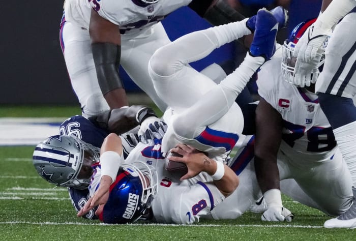 Cowboys DE DeMarcus Lawrence says trash thrown on field was