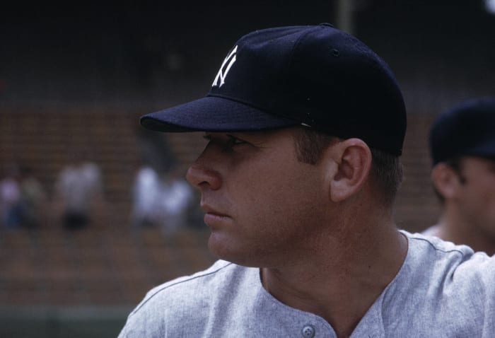 Lennox Hill Hospital, Manhattan, NY, October 6, 1951 – Rookie Mickey Mantle  watches his Yankees play after hurting knee in World Series play