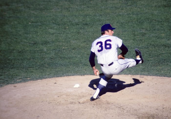 History of Mets uniforms - Pitcher Rick Reed wearing white cap from 1997  season.