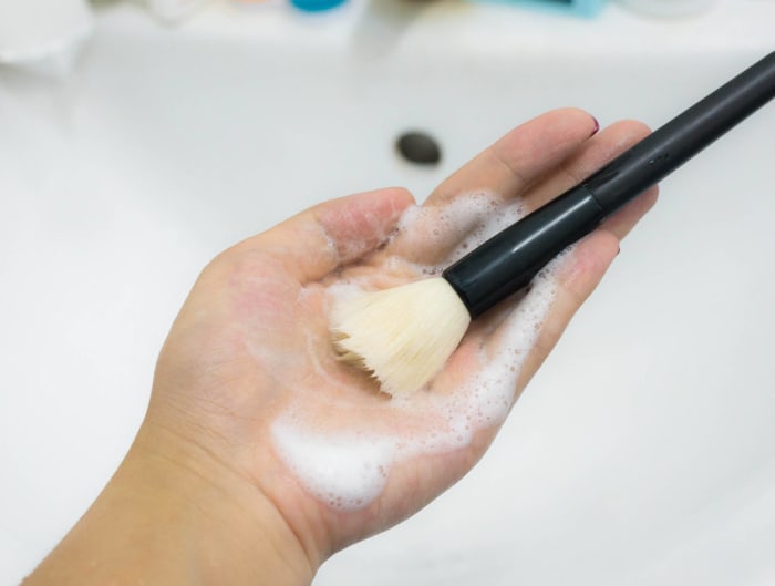 Clean your makeup brushes more often than you think