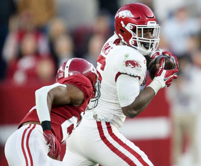 Green Bay Packers (via Raiders): Treylon Burks, WR, Arkansas