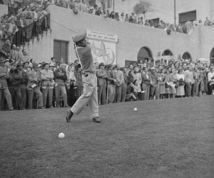 Hogan rolls to second title in three years