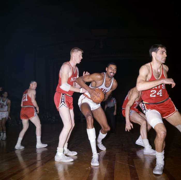 Wilt Chamberlain scores 100