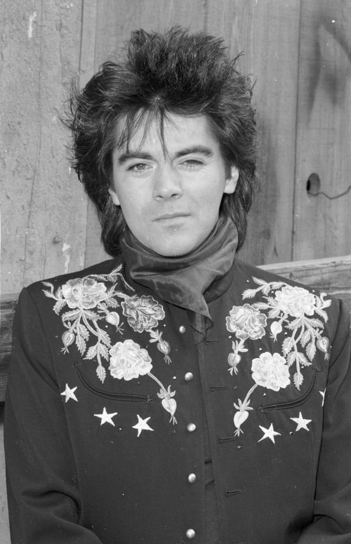 Marty Stuart got his start as a touring musician alongside country and bluegrass legends