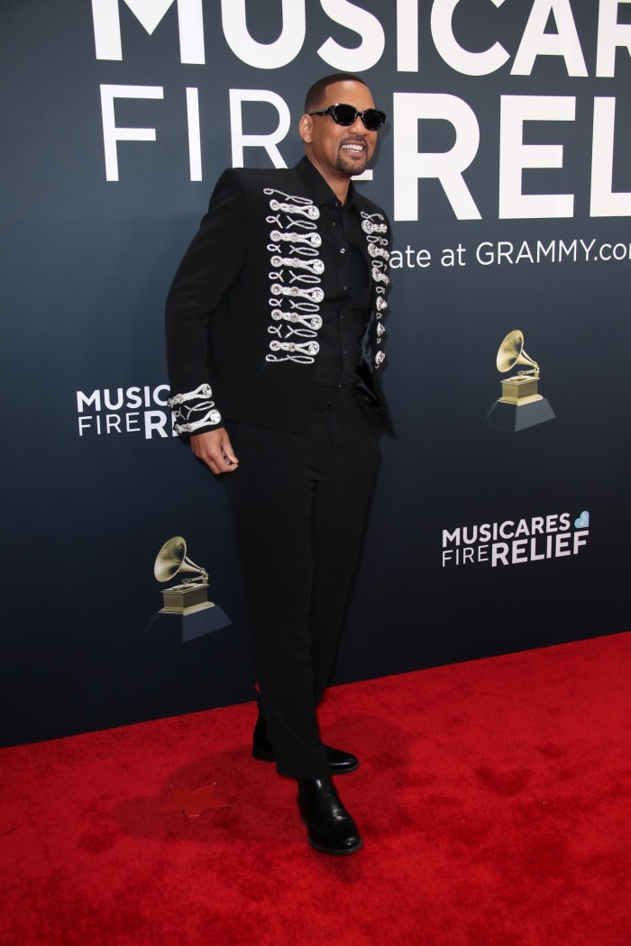 Will Smith slapping red carpet attendee
