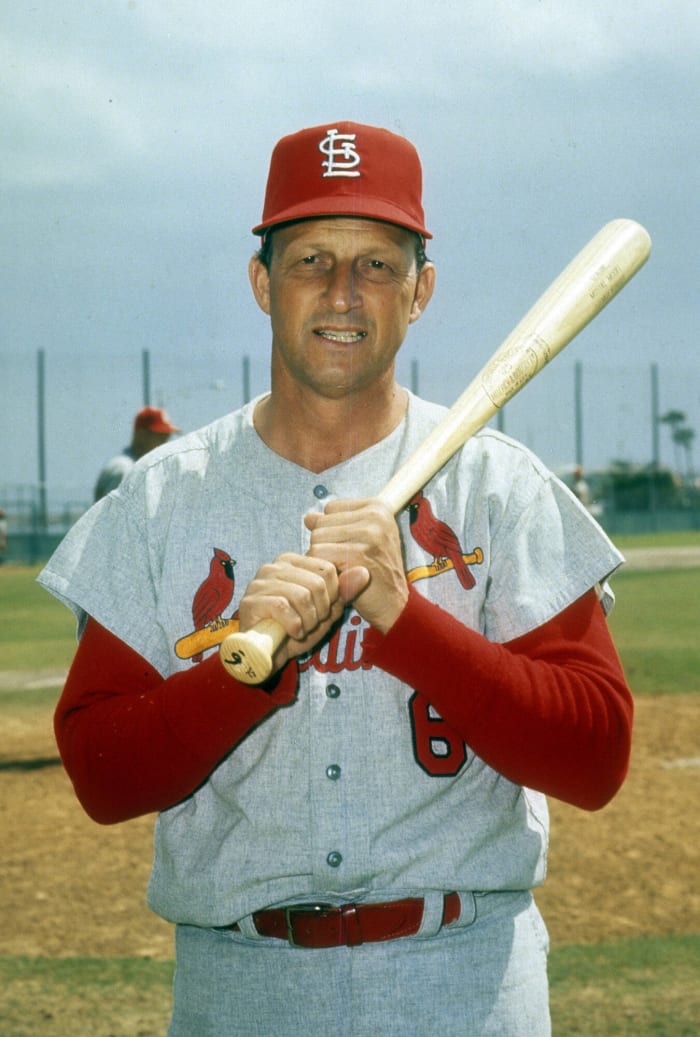 Stan Musial Holding Baseball Bat by Bettmann