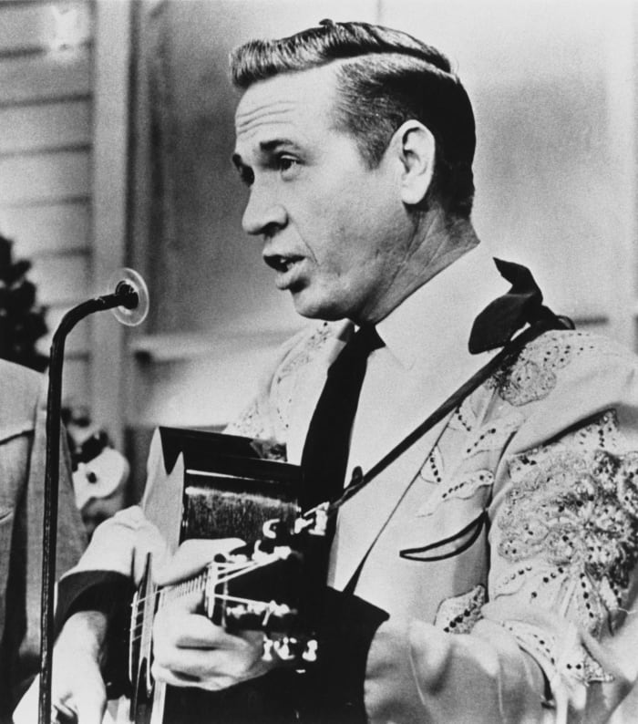 "I've Got A Tiger By The Tail," Buck Owens