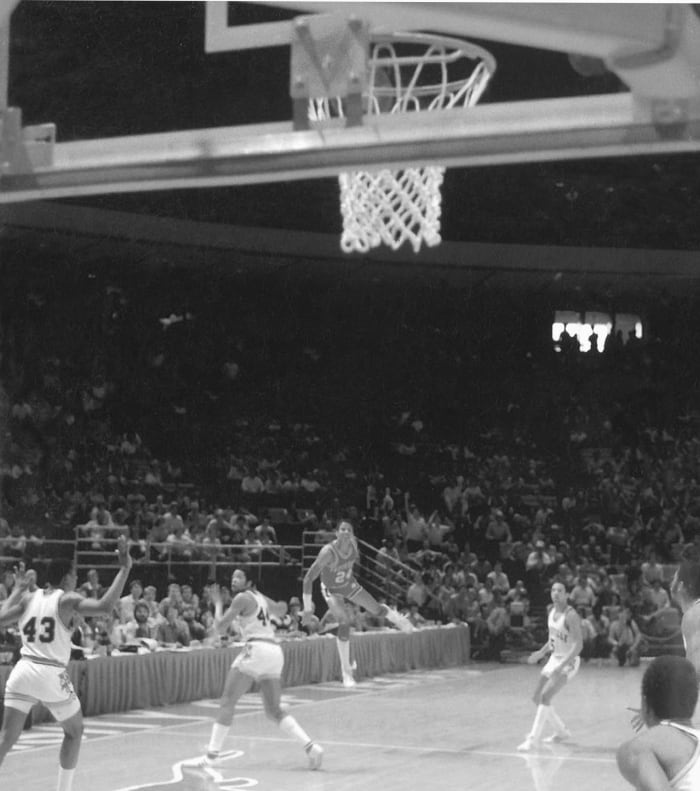 U.S. Reed's half-court heave beats the defending champs