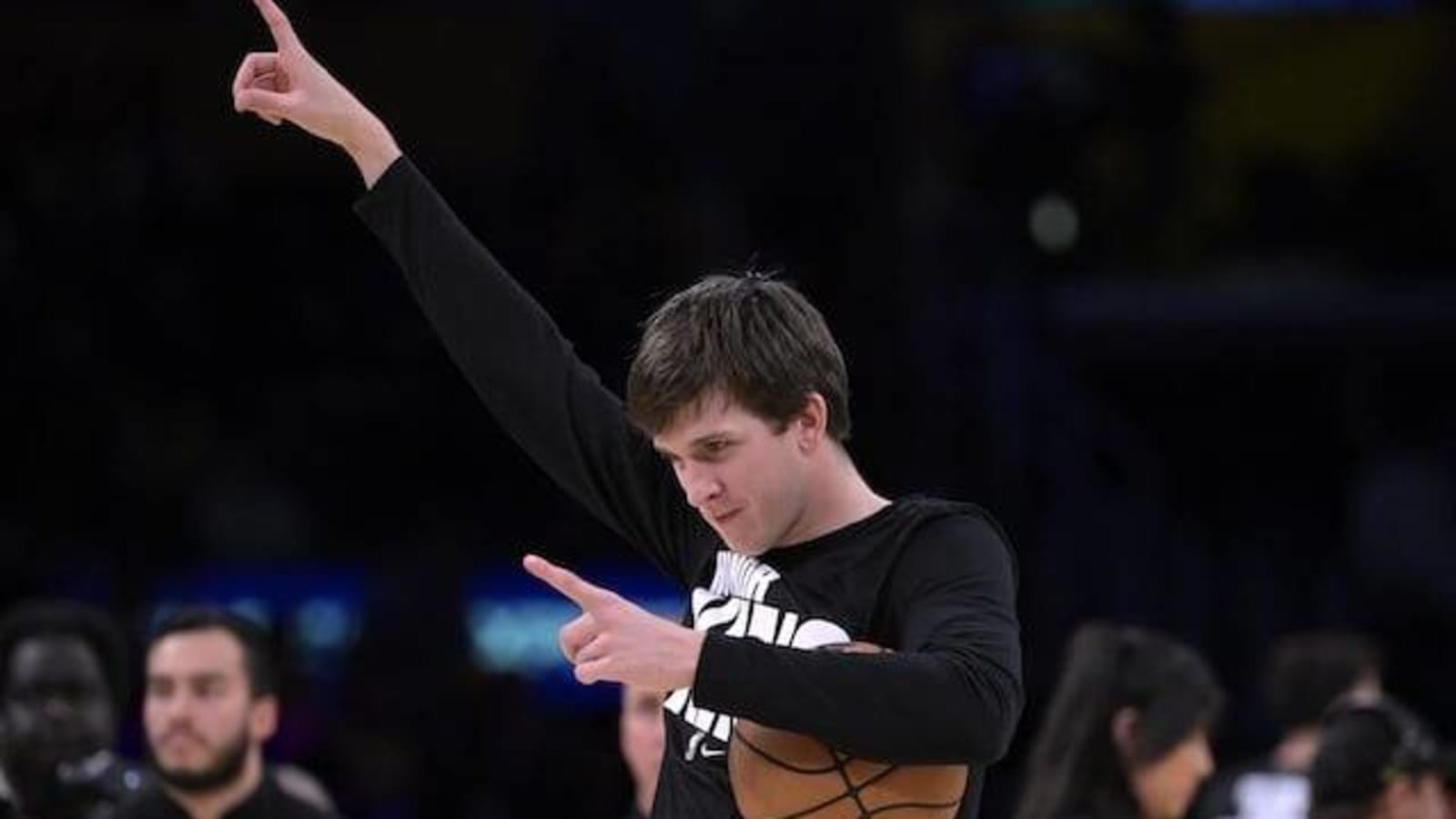 Watch: Austin Reaves Gifts Shoes To Fans After Losing ‘Rock, Paper, Scissors’