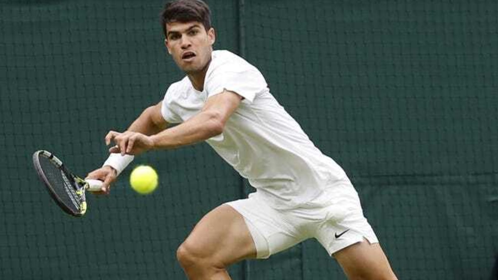 Carlos Alcaraz tops Frances Tiafoe in 5-set Wimbledon battle