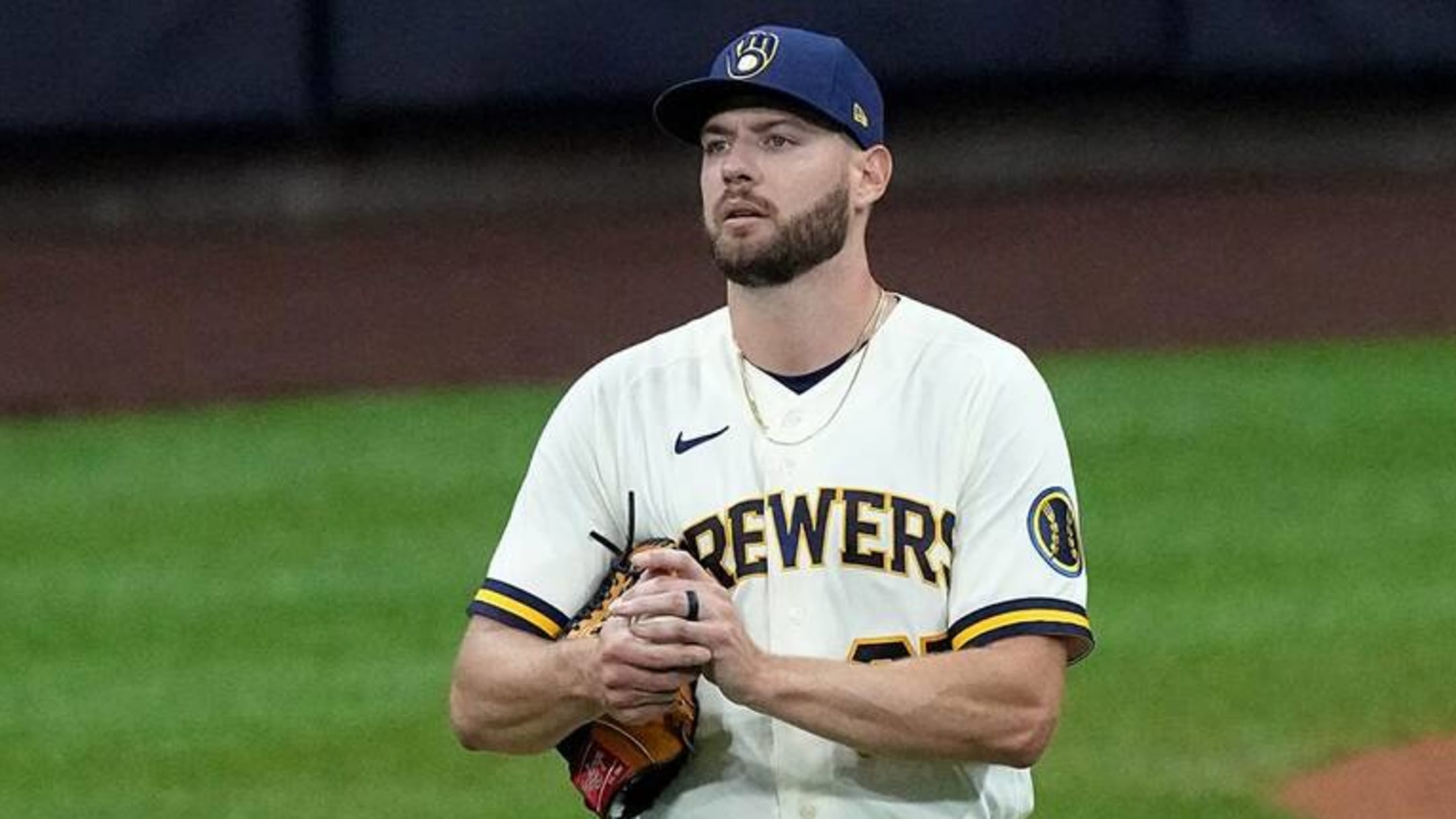 Milwaukee Brewers place right-hander Adrian Houser on the 15-day IL with  elbow stiffness