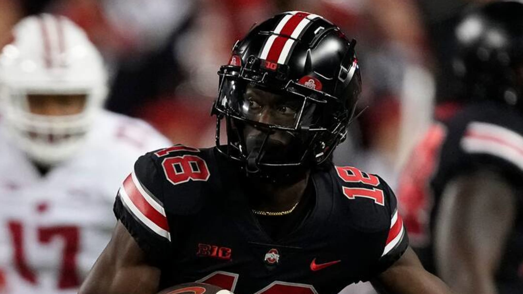 LOOK. Marvin Harrison Jr with an Apple Watch and designer cleats on the  field vs. Wisconsin