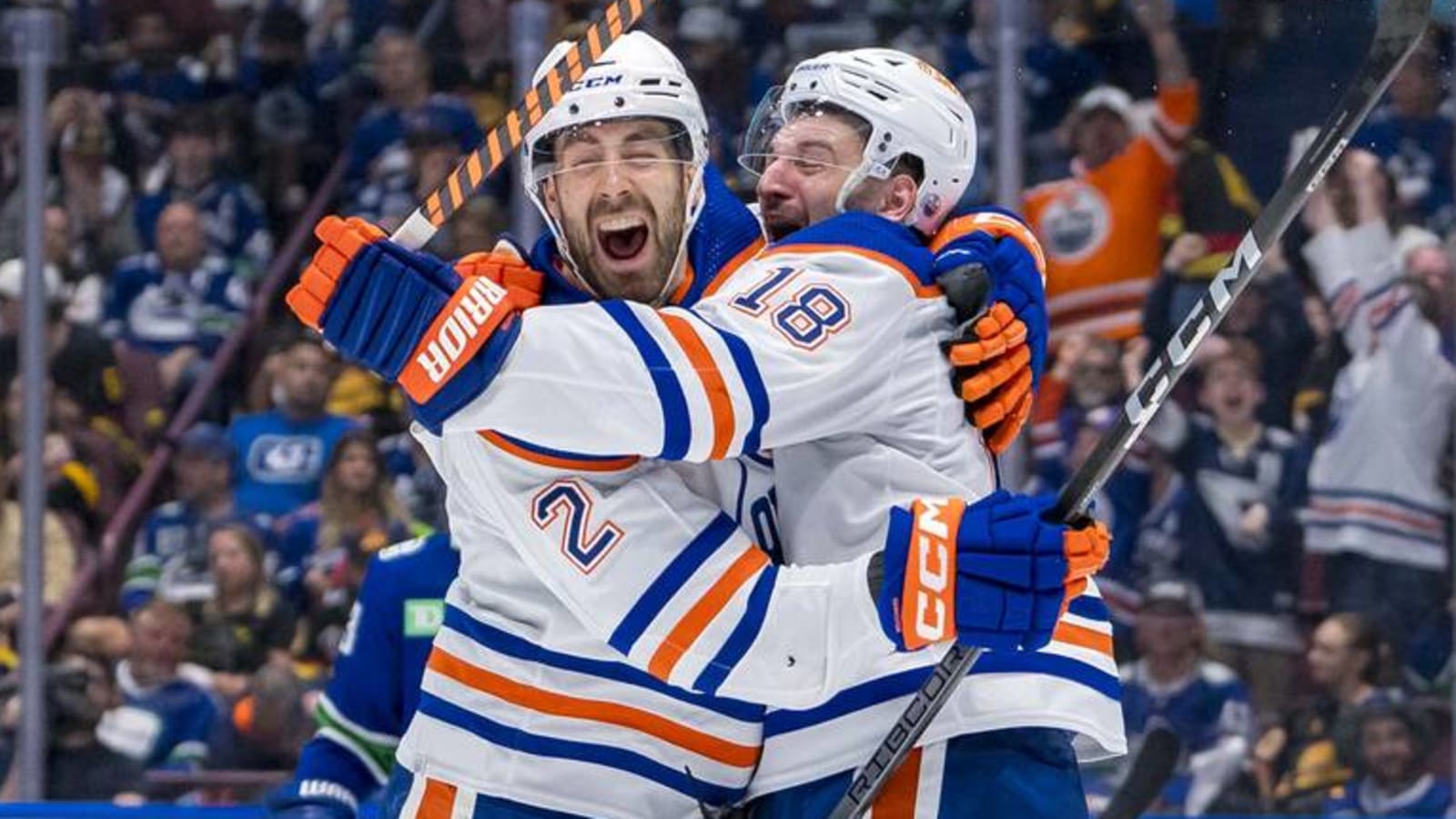 Oilers work overtime to tie Canucks at 1-1