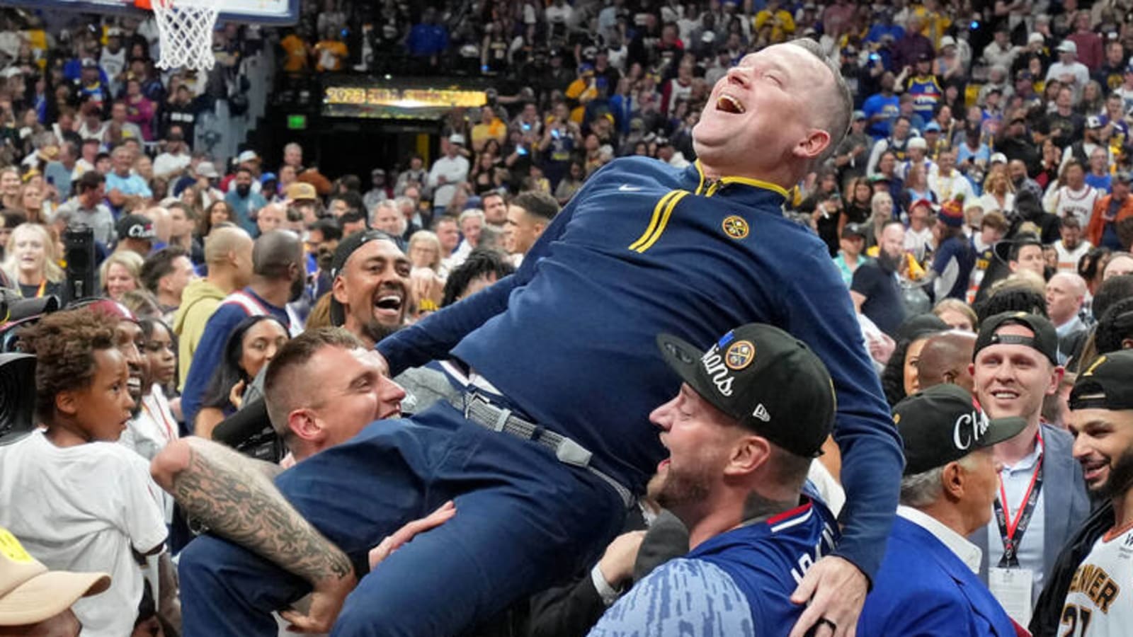 Watch: Malone gets lifted up by Jokic brothers in celebration