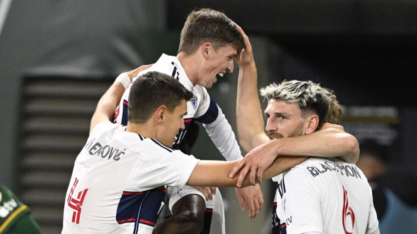 Vancouver pummels Portland to punch MLS playoff ticket
