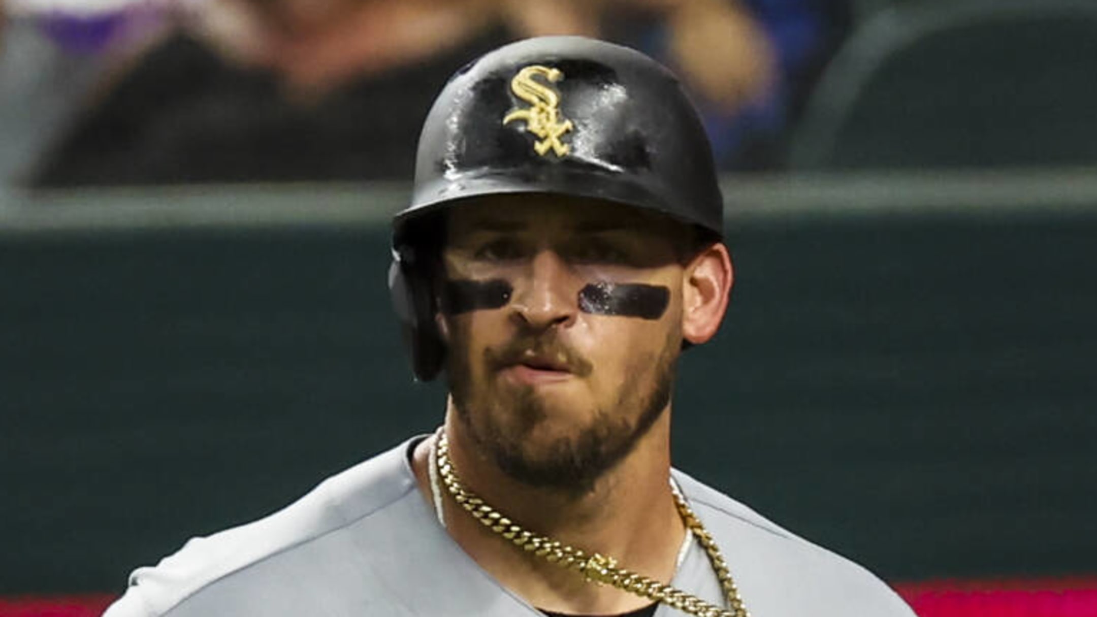 White Sox C Yasmani Grandal helped off field after apparent leg