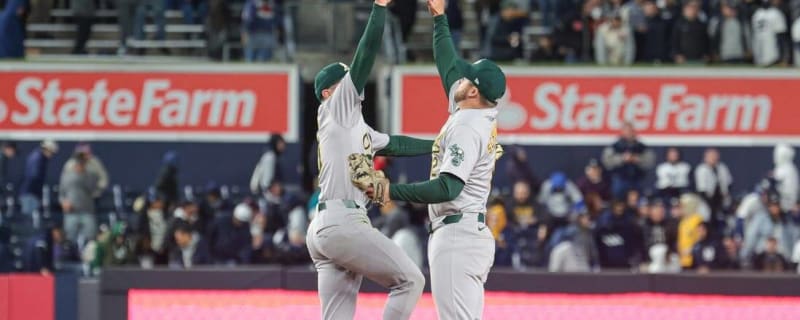 Athletics keep homers coming, earn series split with Yankees