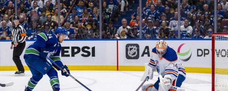 Evan Bouchard&#39;s OT tally lifts Oilers over Canucks in Game 2