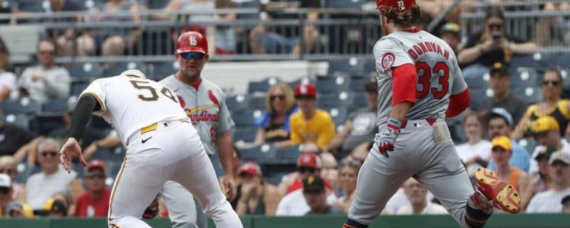 Cards hold off Pirates in extras, win series